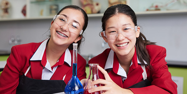 openday Two students conducting a science experiment
